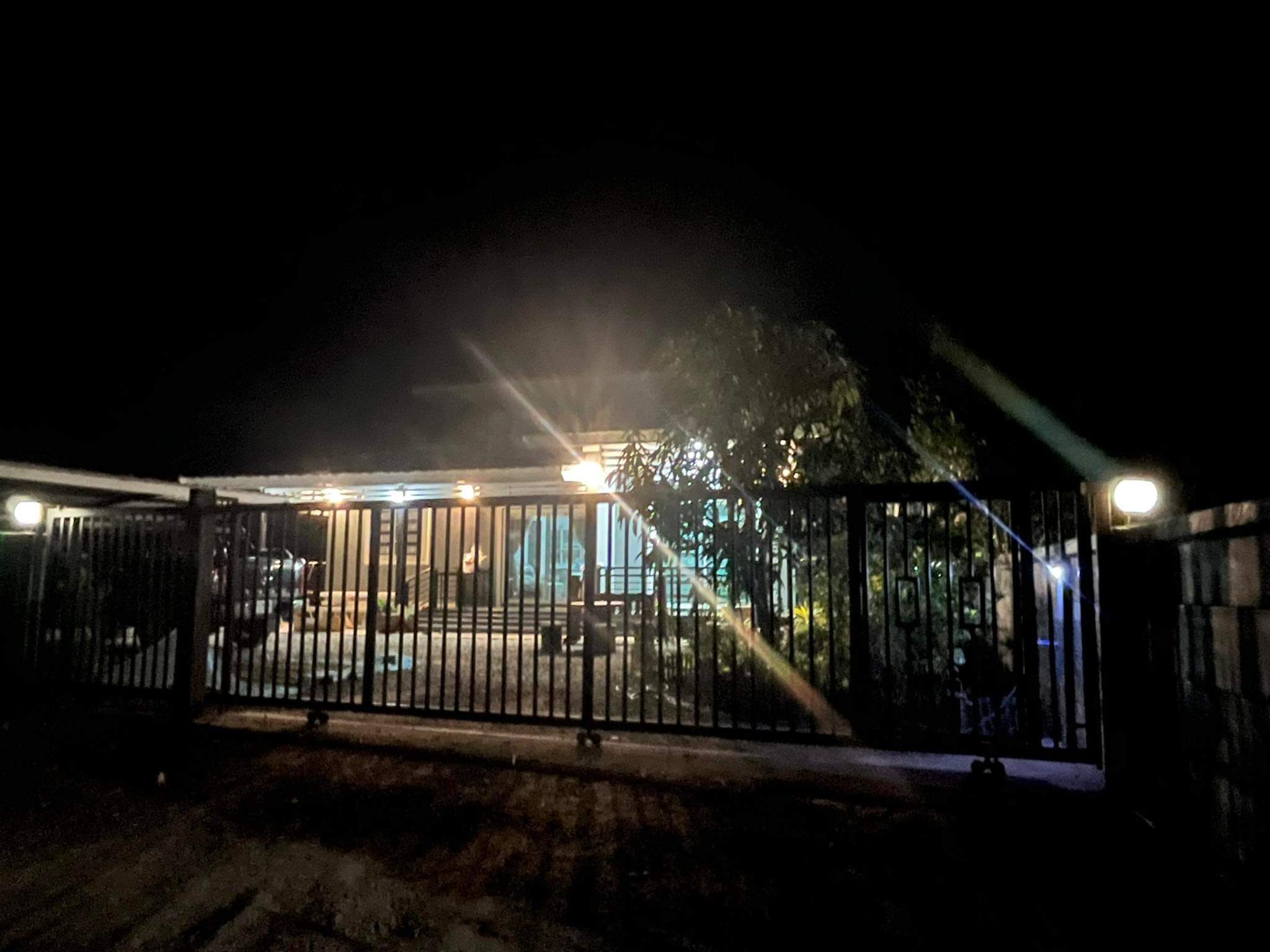 Our family home at night in rural Thailand